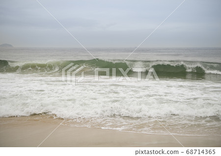 Ocean surf on the beach of Copacabana. Rio de Janeiro, February 2020 68714365