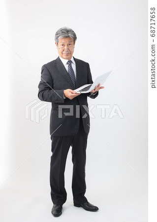 Full-body suit with a laptop PC President and CEO Checking sales and other PCs 68717658