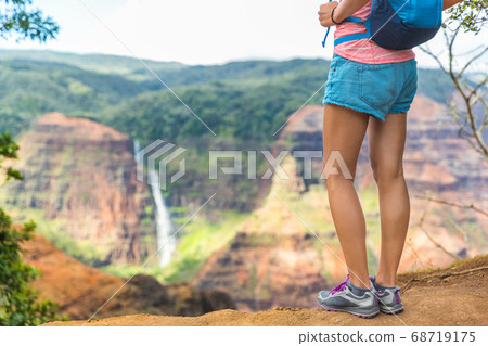 HIking hiker at Kauai Hawaii Waimea waterfall HIking hiker at Kauai Hawaii Waimea waterfall 68719175