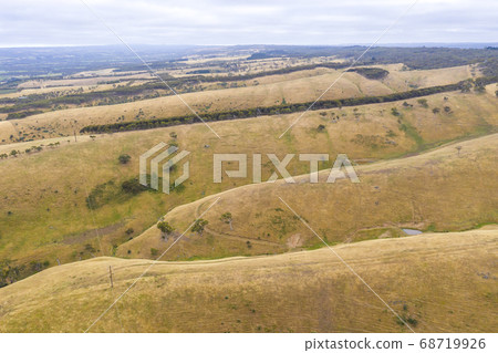 Aerial view of rolling green hills in regional Australia Aerial view of rolling green hills in regional Australia 68719926