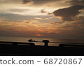 Calm sunset seen from the sea 68720867
