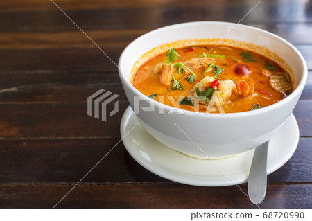 Tom Yam kung Spicy Thai soup with shrimp in white Tom Yam kung Spicy Thai soup with shrimp in white 68720990