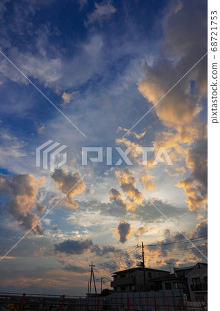 Sunset sky and residential area 68721753