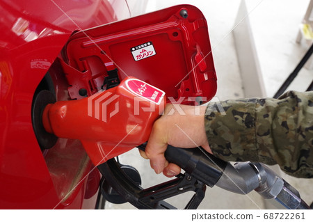 Refueling regular gasoline at a self-service gas station Refueling regular gasoline at a self-service gas station 68722261