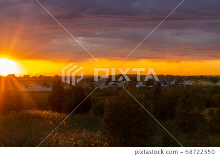 Very beautiful sunset in the city or village. 68722350