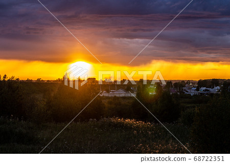 Very beautiful sunset in the city or village. Very beautiful sunset in the city or village. 68722351
