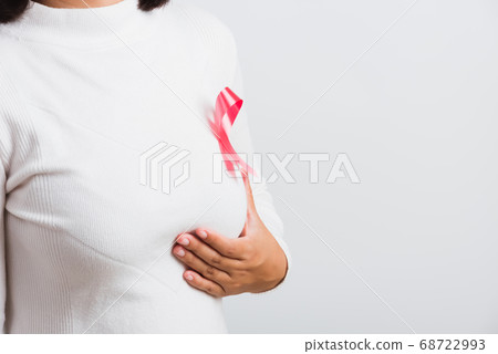 woman she have pink breast cancer awareness ribbon woman she have pink breast cancer awareness ribbon 68722993