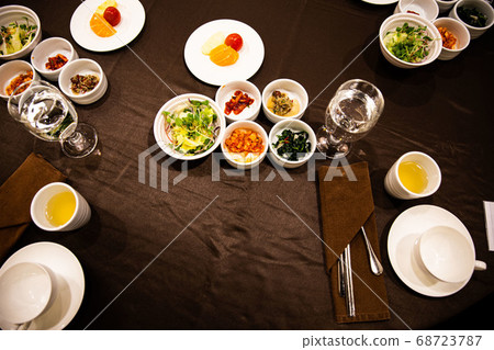 Breakfast at the hotel, Korean food and kimchi, vegetables, salad, pickled fish, mackerel, and water glass 68723787