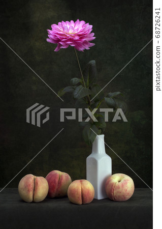 Still life with peaches and dahlia flower 68726241