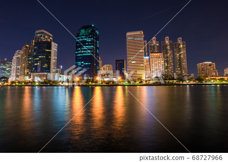 Modern building light with pond public park at 68727966