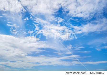 Blue sky and white puffy clouds Blue sky and white puffy clouds 68730867