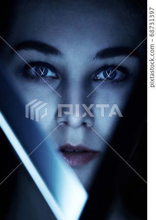 face in neon light 68731397