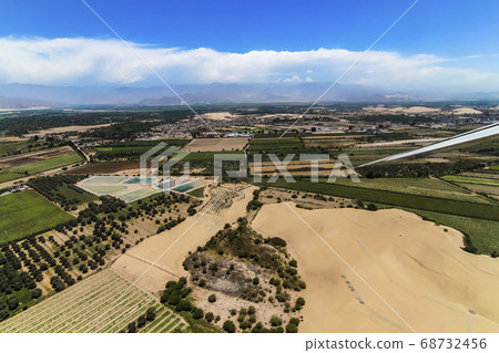 Airplane view of the ground area after taking off 68732456