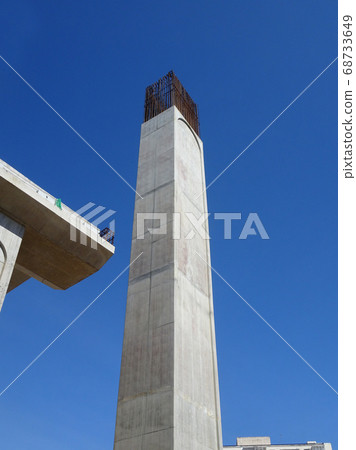 SEREMBAN, MALAYSIA -MARCH 7, 2020: Steel reinforced concrete column under construction. Reinforcement bar on top of column ready for the next stage of construction. 68733649