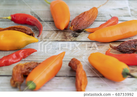 View of several Peruvian peppers, such as yellow View of several Peruvian peppers, such as yellow 68733992