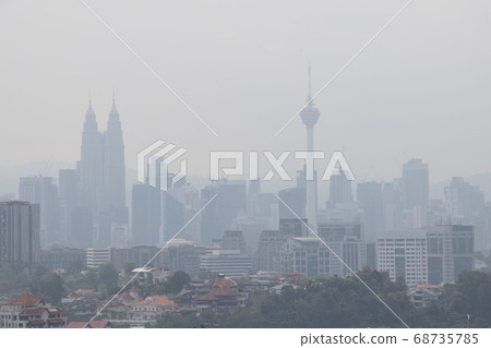 Hazy Kuala Lumpur city skyscape due to haze from Hazy Kuala Lumpur city skyscape due to haze from 68735785