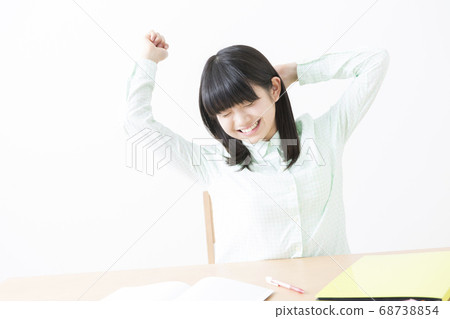 Girl studying and resting Girl studying and resting 68738854