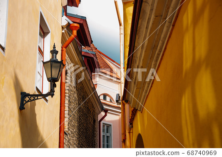 Upper town street medieval buildings in Tallinn, Estonia 68740969