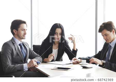 Business people on meeting Business people on meeting 68742369