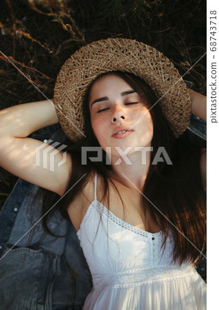 Happy carefree woman enjoy her vacation in nature Happy carefree woman enjoy her vacation in nature 68743718