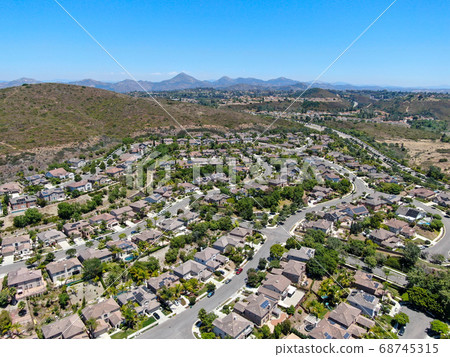 Aerial view of suburban neighborhood with big mansions in San Diego Aerial view of suburban neighborhood with big mansions in San Diego 68745315