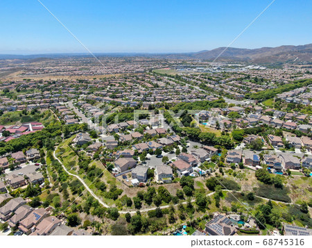 Aerial view of suburban neighborhood with big mansions in San Diego 68745316