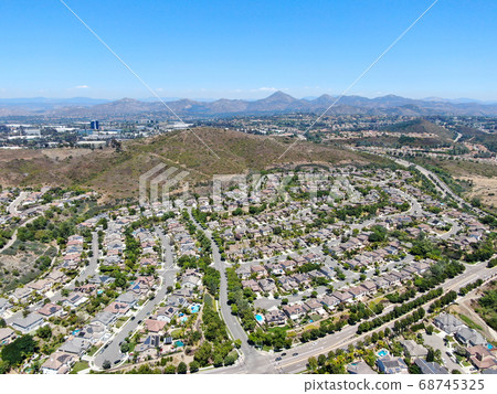 Aerial view of suburban neighborhood with big mansions in San Diego 68745325