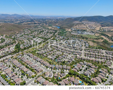 Aerial view of suburban neighborhood with big mansions in San Diego Aerial view of suburban neighborhood with big mansions in San Diego 68745374