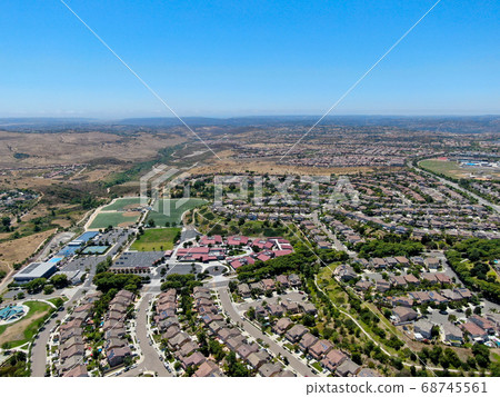 Aerial view of suburban neighborhood with big mansions in San Diego 68745561