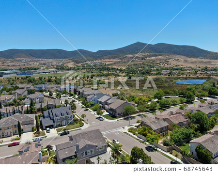 Aerial view of suburban neighborhood with big mansions in San Diego 68745643