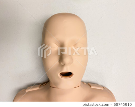 CPR dummy on white background for first aid and cardiopulmonary resuscitation training CPR dummy on white background for first aid and cardiopulmonary resuscitation training 68745910