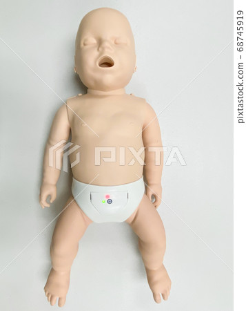 Child's doll for CPR training and child's heart massage first aid 68745919