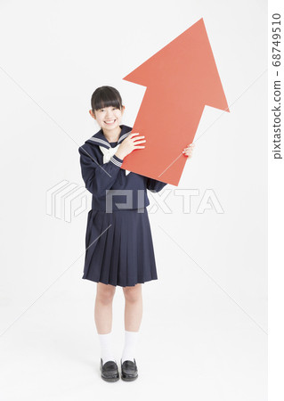 Junior high school girls with an up arrow 68749510