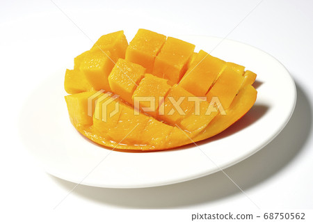 Mango of diced tropical fruits on a plate Mango of diced tropical fruits on a plate 68750562