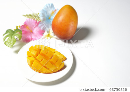 Dice-cut tropical fruit mango and hibiscus artificial flower (white background) 68750836