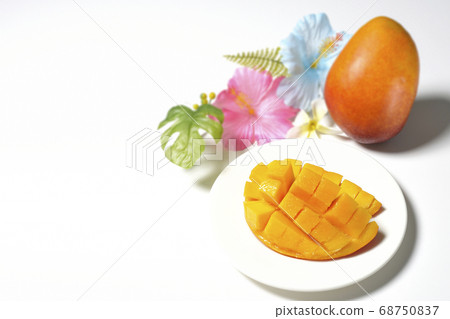 Dice-cut tropical fruit mango and hibiscus artificial flower (white background) 68750837
