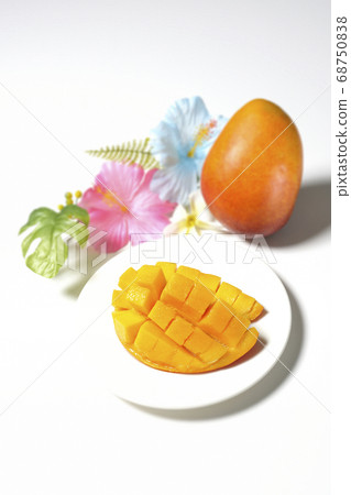 Dice-cut tropical fruit mango and hibiscus artificial flower (white background) 68750838