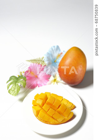 Dice-cut tropical fruit mango and hibiscus artificial flower (white background) 68750839