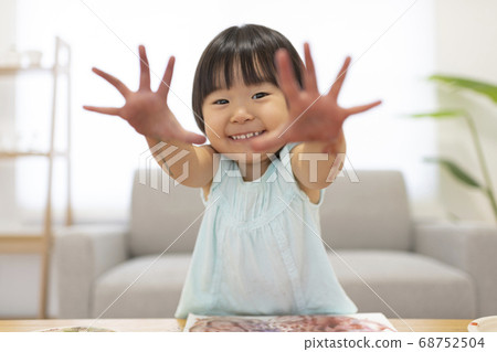 Kids finger painting play 68752504