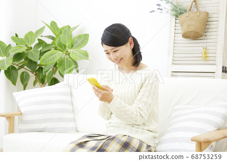 Female smartphone Female smartphone 68753259