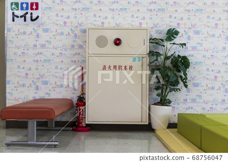 Firefighting equipment _ Indoor fire hydrant and fire extinguisher in shopping center 68756047