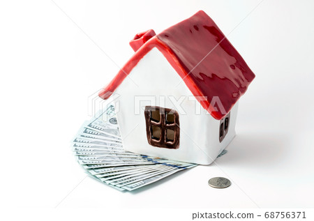 small white porcelain house with a red roof and money dollars rent purchase realtor small white porcelain house with a red roof and money dollars rent purchase realtor 68756371