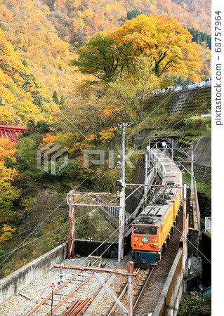 Kurobe Gorge and trolley train in autumn colors Kurobe Gorge and trolley train in autumn colors 68757964