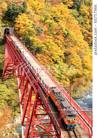 Kurobe Gorge and trolley train in autumn colors Kurobe Gorge and trolley train in autumn colors 68757966