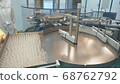 coronavirus. Pharmaceutical optical inspection machine for ampoules, medical vials and vials. Manufacturing of the vaccine 68762792