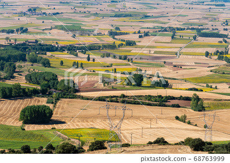 High angle view of farmland with fields for sunflower cultivation High angle view of farmland with fields for sunflower cultivation 68763999