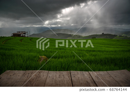 The beautiful scenery of the green terraced rice field of Bong Piang forest village. The beautiful scenery of the green terraced rice field of Bong Piang forest village. 68764144