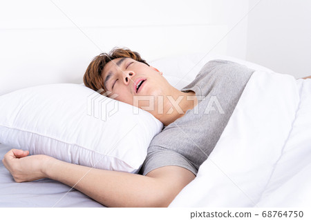 Man snoring loudly because of tired from work, Man snoring loudly because of tired from work, 68764750