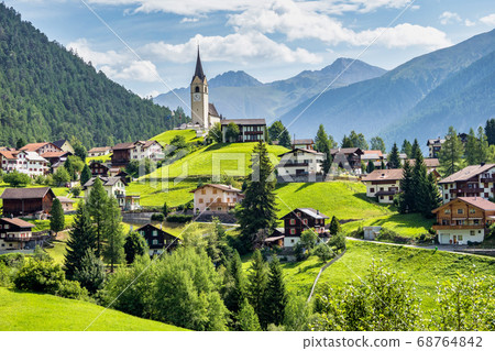 Beautiful Schmitten village at Albula pass in 68764842