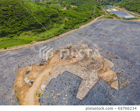 Aerial top view photo from flying drone of large garbage pile. Garbage pile in trash dump or landfill. Environmental pollution 68766234